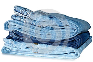 Stack of blue jeans outerwear.