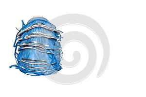 Stack of blue respirators isolated on a white background.