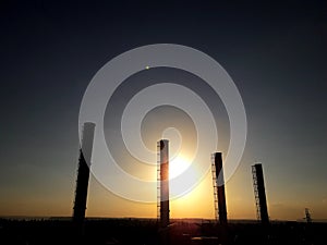 Stack of boiler on twilight sunset background
