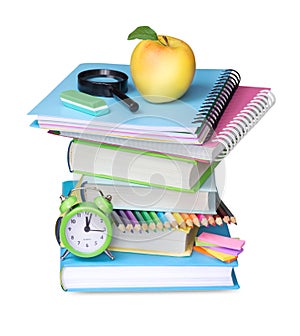 Stack of books with apple isolated.School office supplies.