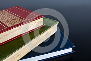 Stack Of Books in a Black Background