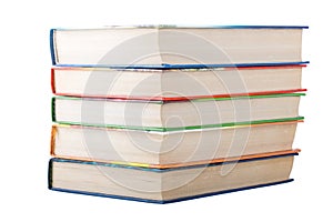 A stack of books in color covers isolated on white background