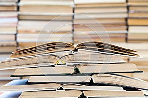 A stack of books with colorful covers. The library or bookstore. Books or textbooks. Education and reading