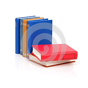 Stack of books in colour covers with white sheets