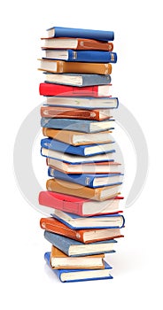 Stack of books in colour covers with white sheets