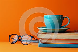 A Stack of Books, Cup of Coffee, and Reading Glasses