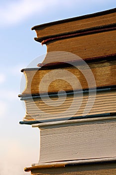 Stack of Books in front of Sky