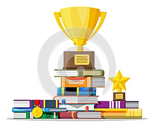 Stack of books with golden cup trophy and medal.