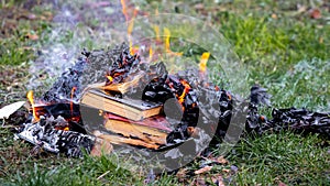 Stack of books on the hearth, barbaric attitude to books