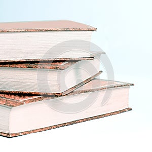 Stack of books.isolated on blue background. photo with copy space