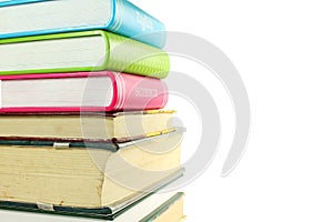 Stack of books isolated closeup on white background
