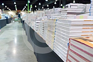 Stack books and magazines on table. Book festival concept.