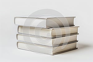 A stack of books with the top one being the thickest