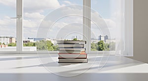 Stack of Books on a White Table with a View Through a Window