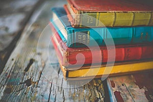 Stack of Books on Wooden Table. Generative AI