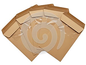 Stack of brown paper envelopes isolated on white background