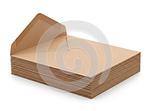 Stack of brown paper envelopes isolated on white background