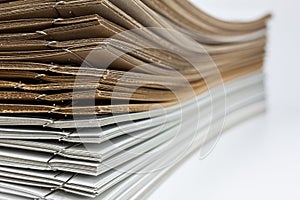 Stack of brown and white paper