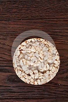 Stack of crispbreads on dark wooden table