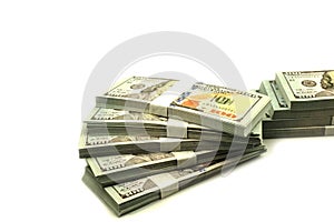 Stack bundles of 100 US dollars banknotes