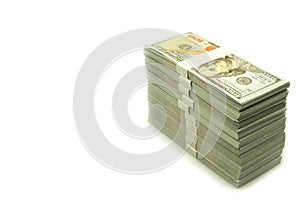 Stack bundles of 100 US dollars banknotes