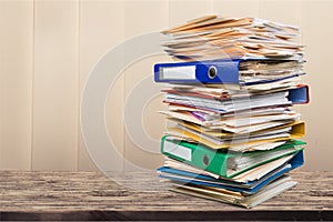 Stack of business documents on background