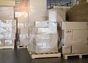 Stack of cardboard boxes on pallet rack in warehouse storage. Shipment. Cargo import and export. manufacturing warehousing