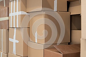 Stack of cardboard boxes ready to be shipped of a warehouse. Package storage room