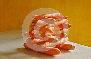 stack of carrots with beautiful lighting, healthy eating, dieting,springtime vegetable concept, free copy space