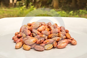 Stack of Cashews on White Plate