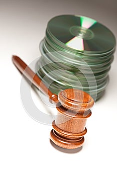 Stack of CD Rom or DVD Discs and Gavel