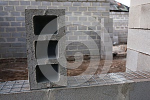 Stack of cement blocks at the construction site. cinder blocks background.