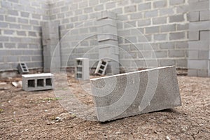 Stack of cement blocks at the construction site. cinder blocks background.