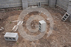 Stack of cement blocks at the construction site. cinder blocks background.