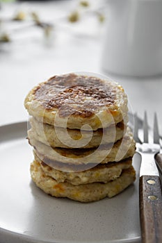 stack of cheese flapjacks. Rounf pancakes made from cotage cheese