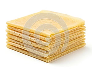 Stack of cheese slices isolated on white background