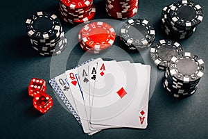 Stack of chips and cards on a table - poker game concept