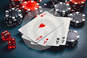 Stack of chips and cards on a table - poker game concept