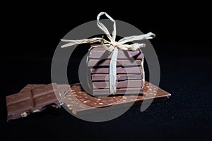 A stack of choclate bars packed as a gift