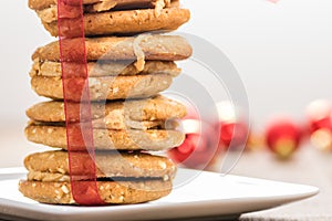 Stack of Christmas Cookies tied with red ribbon