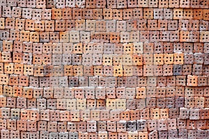Stack of clay bricks texture background