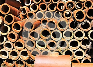 A Stack of Clay Drainage Pipes