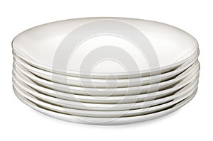 Stack of clean ceramic plates on white