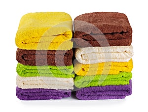 Stack of clean fresh towels isolated on background