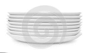 Stack of clean plates on white background