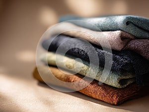 A stack of clothes in different colors. Generative AI.