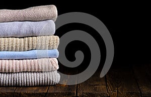 Stack of clothes from knitted knitwear