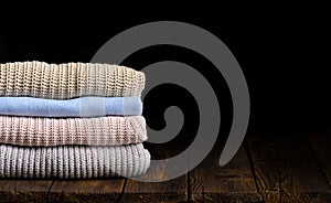 Stack of clothes from knitted knitwear