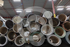 stack of Coil steel metal rolls in metal roofing factory