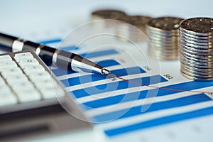 Stack of coin with bar graph